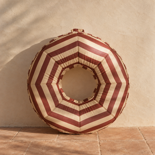 The Rondo striped canvas-covered inflatable pool ring