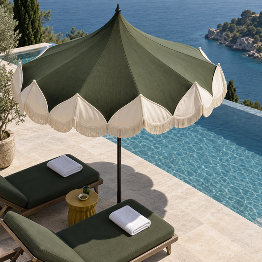 The Portofino pagoda garden parasol with cream petal scallops and hand-knotted fringe
